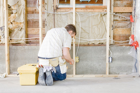 Worker doing residential remodeling in O'Fallon